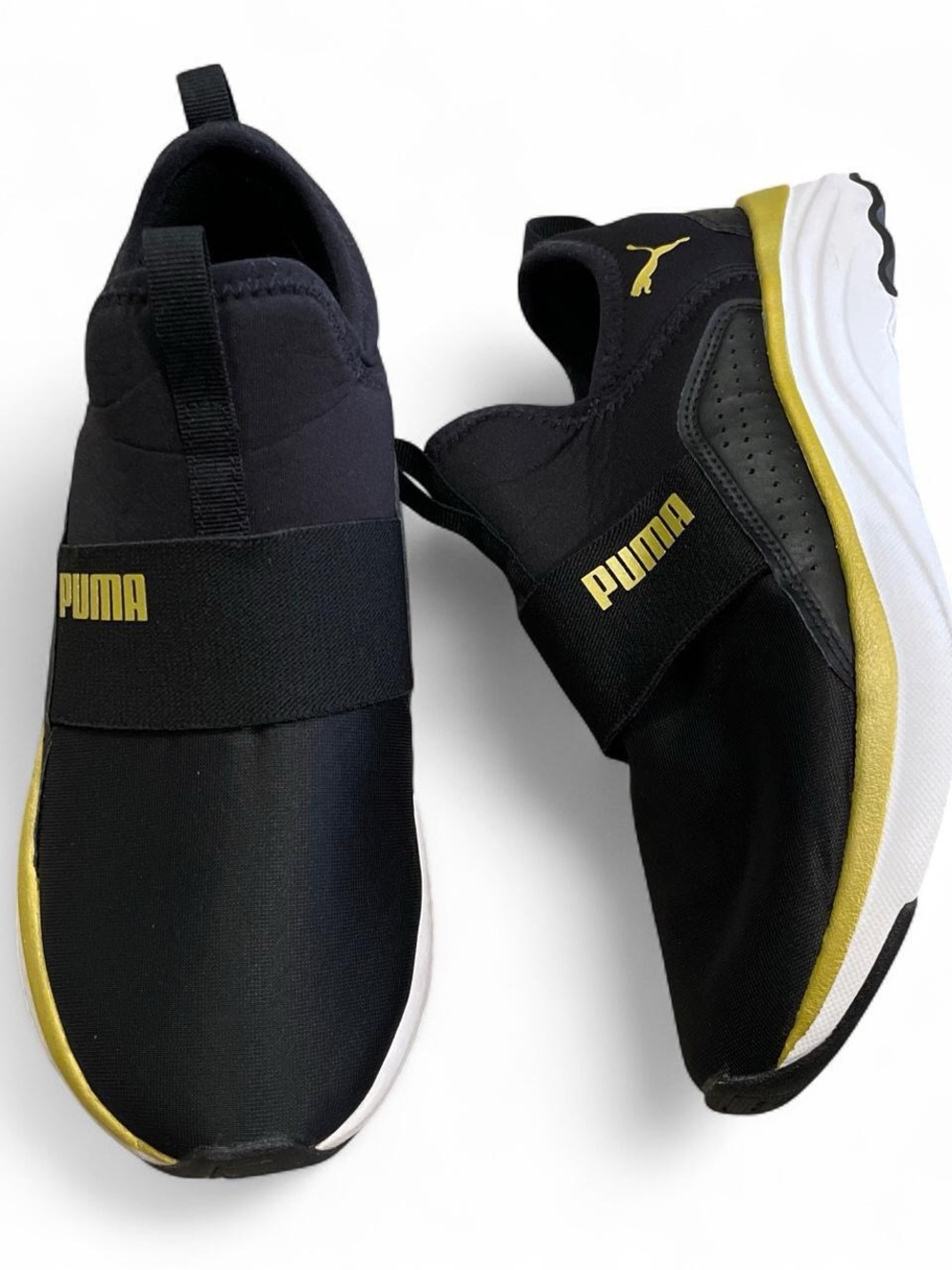 Puma Black Slip-On Sneakers with Gold Accents